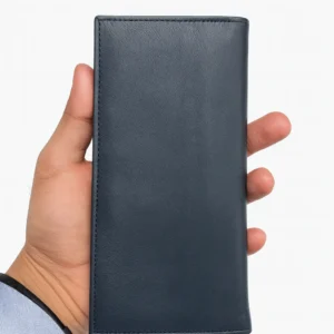 Long leather wallets navy blue holding in hand